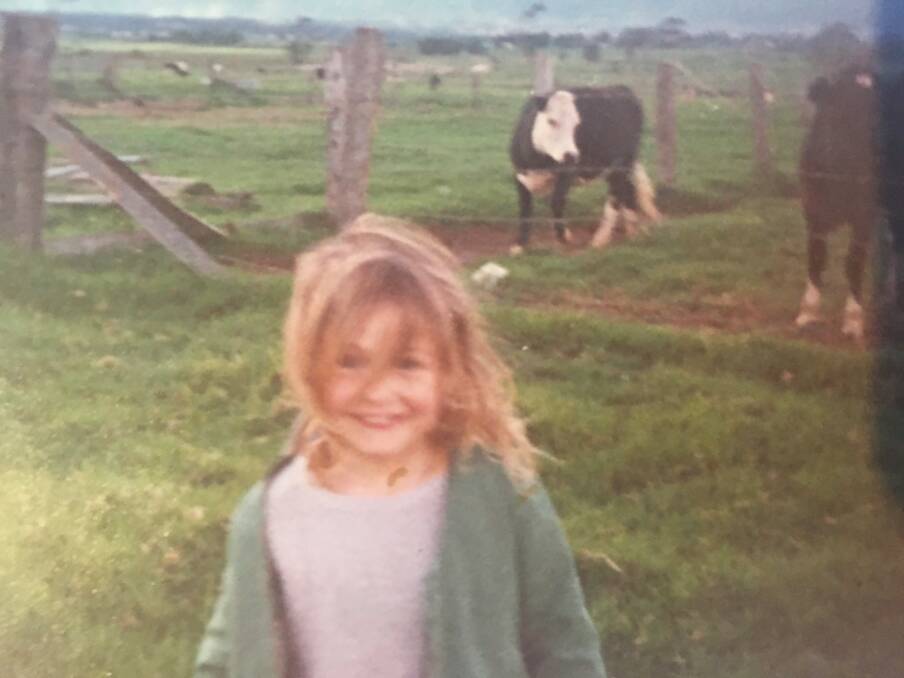 A young Fiona Phillips on the dairy farm where she grew up near Nowra on the NSW South Coast.