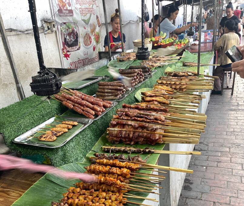 The huge array of meat skewers on offer at a street market in Indonesia. Photo by Mark Phelps.