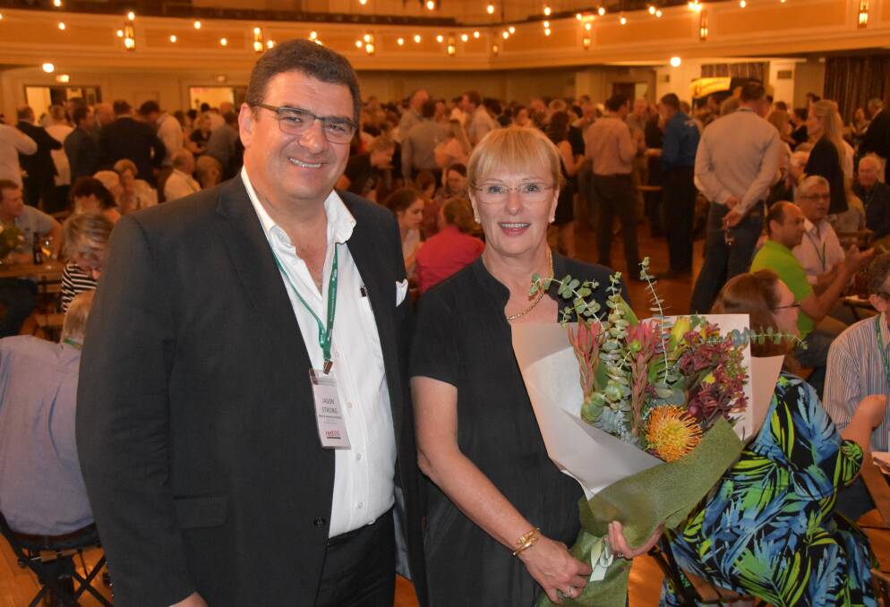 Meat & Livestock Australia's managing director Jason Strong and outgoing chair Dr Michele Allan at the Red Meat 2019 social function at Tamworth Town Hall.