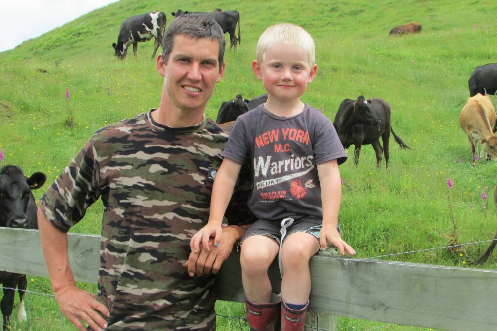 New Zealand dairy farmer Richard Fowler and son Hadlee.