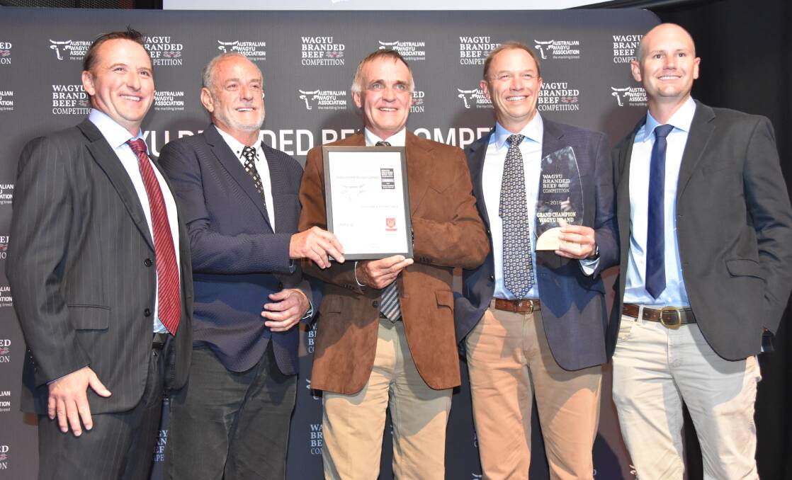 The Mort and Co team celebrate taking out top honours in this year's Wagyu branded beef awards. From left are Tim Burgess, sponsor John Kilroy from Cha Cha Char restaurant in Brisbane, Richard Hughes, Berry Reynolds and Scott McDouall.
