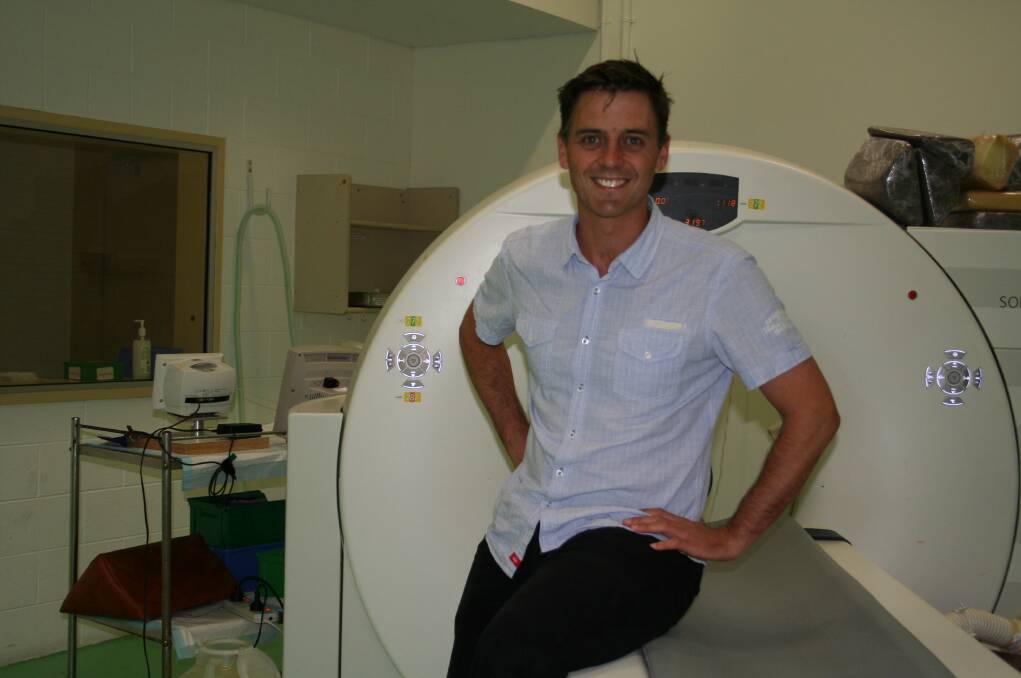 ADVANCEMENTS: Meat science researcher associate professor Graham Gardner with a CT scanner.