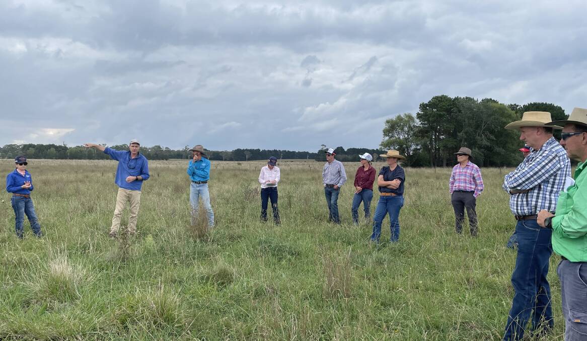 Agriculture scientist Bart Davidson, chief grazing officer with Atlas Carbon, discusses the benefits of rotational grazing with producers at Wilmot Cattle Company's Woodburn property, near Walcha in NSW. Picture Shan Goodwin.