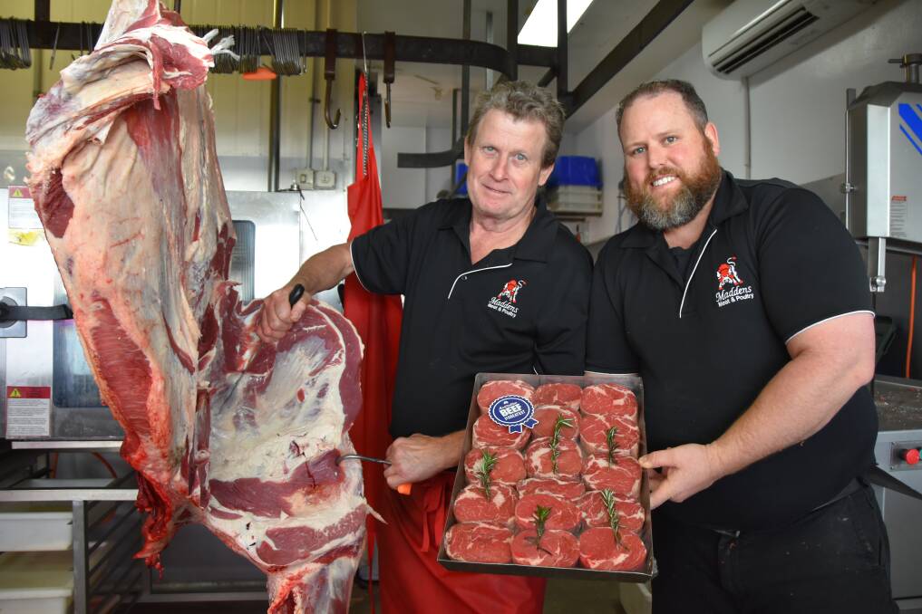 Butchers Brad Harward and Steve Madden, from Madden's Meats at Elanora on the Gold Coast. Mr Harward is breaking down a forequarter.