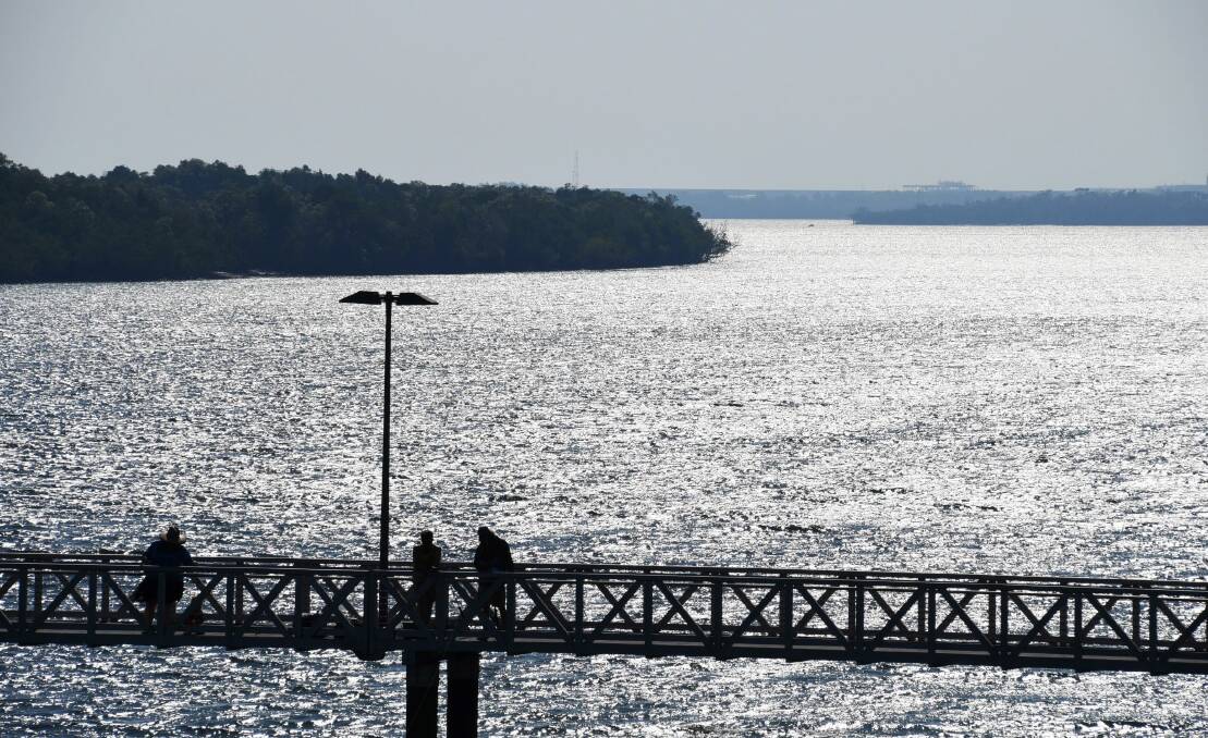 Looking across Elizabeth River towards Darwin with a popular fishing jetty in the foreground, the water sure does look inviting.