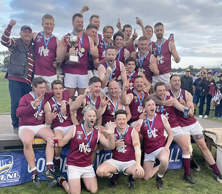 The Nullawil seniors team celebrates victory in last year's Golden Rivers league grand final.