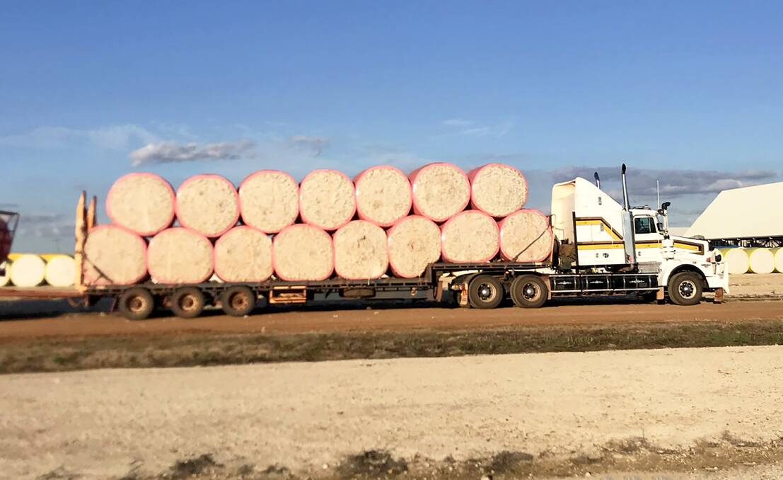 NT cotton off to Queensland for processing - growers had hoped to fully wrap the bales to stop cotton escaping.