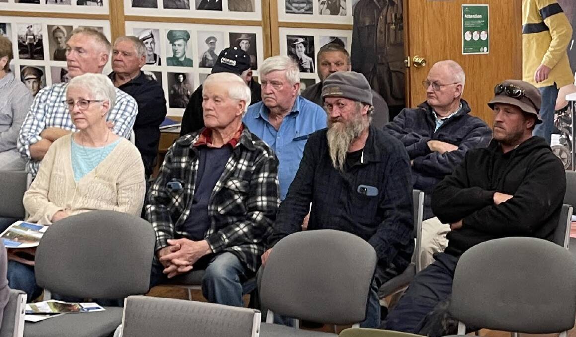 Luke Tranter, pictured far right, was sitting with members of his family at the Penola auction today.