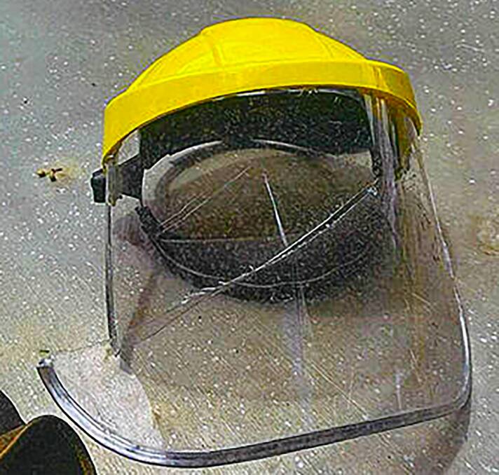 The angle grinder sliced into the safety headgear.