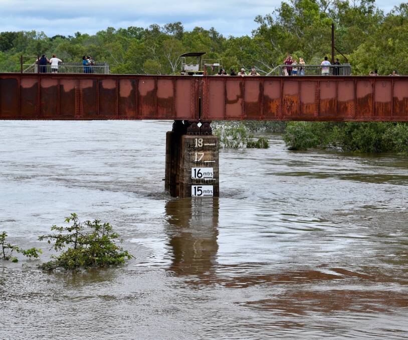 CLOSE LOOK: Residents on the weekend took a close look at the thrilling sight of a Top End river in flood during a good wet season but there remains risks. Picture: Roxanne Fitzgerald. 