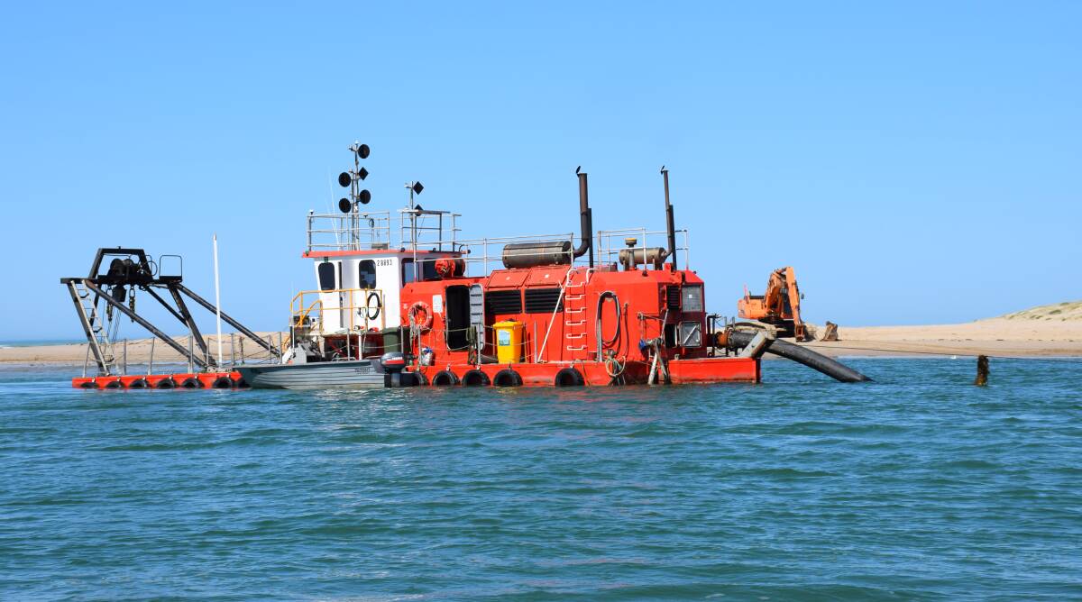 One of two dredges which work around the clock all year to keep the mouth from being blocked by sand.