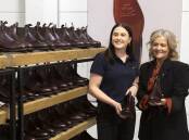 Leather apprentice Chloe Fabian (left) with Tattarang director Nicola Forrest. Picture from RM Williams.