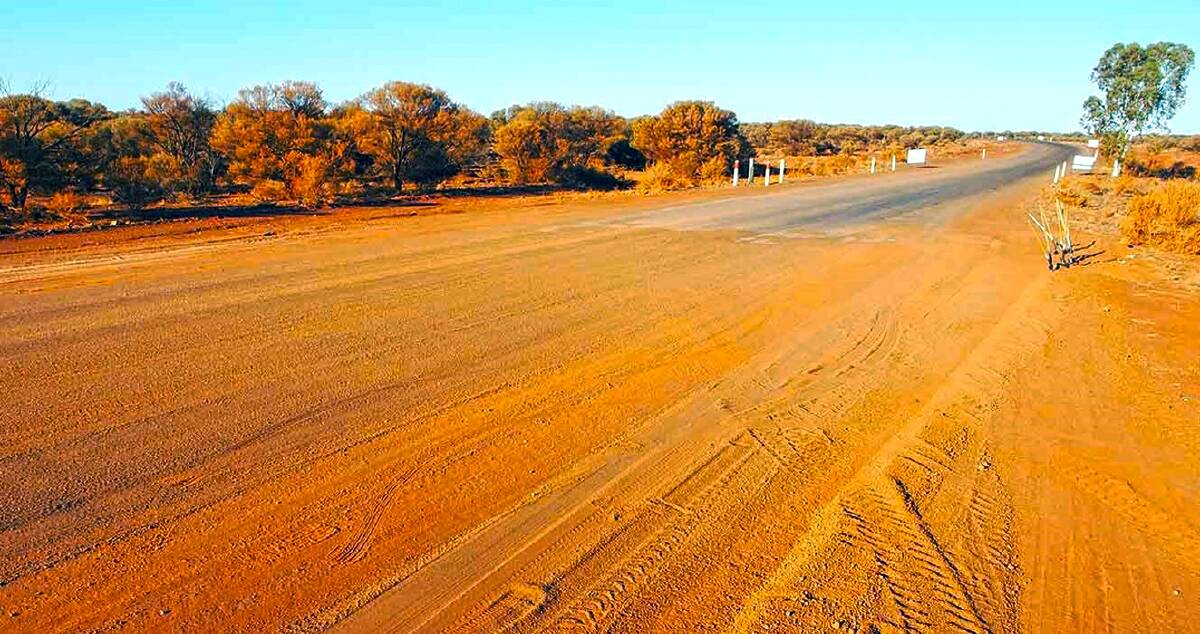 Building a sealed road across central Australia has already taken a decade with almost half the job still to do.