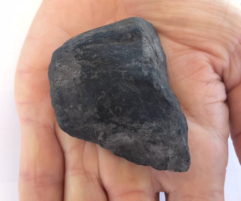 A piece of shale brought up from about three kilometres under the Beetaloo's surface, heavily infused with gas.