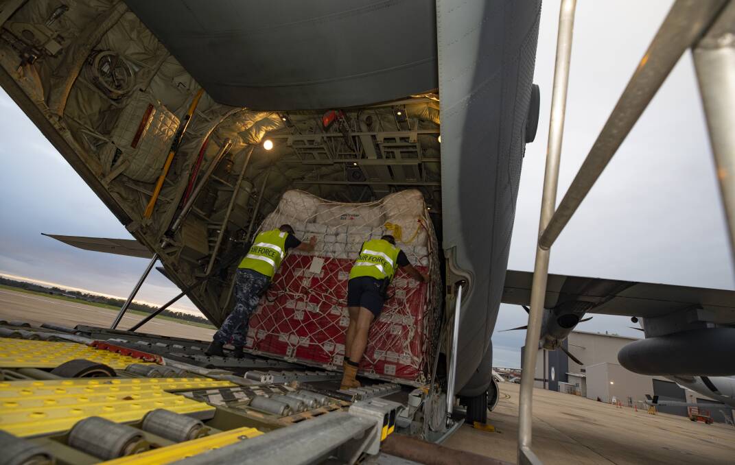 Emergency food aid on the way to Tonga last week to help in the recovery of the volcanic devastation. Picture: RAAF.