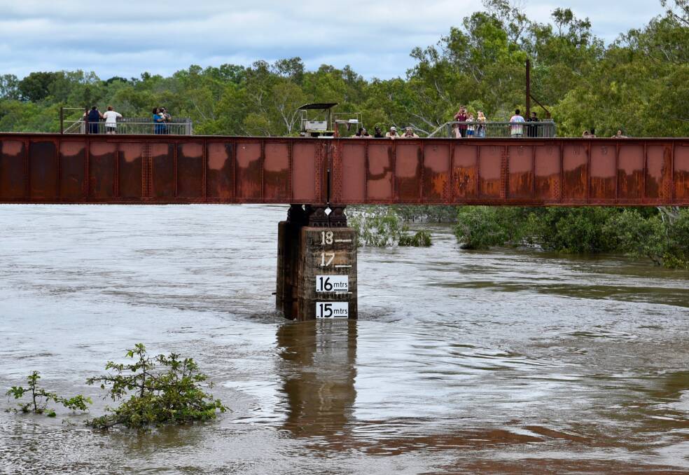 CLOSE LOOK: Katherine residents in February took a close look at the thrilling sight of a Top End river in flood during a good wet season. Picture: Roxanne Fitzgerald.