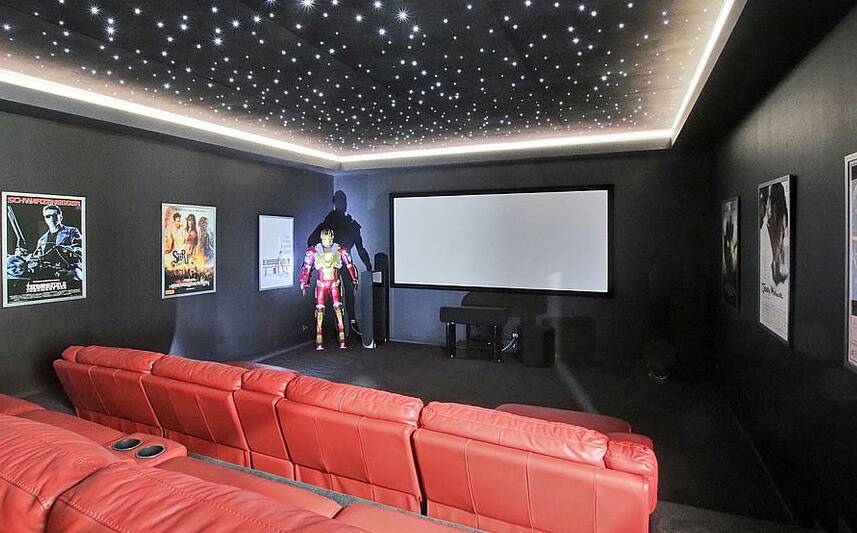 A star-studded home cinema with Ironman in the corner.