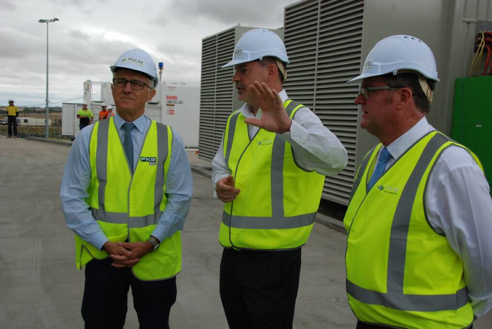 Prime Minister Malcolm Turnbull, Pulse Data Centre manager Peter Blunt and Federal Member for Groom John McVeigh at Pulse Data Centre constrution site.