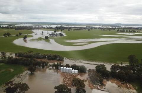 Riverine flooding is a major issue in north central Victoria, with many rivers bursting their banks and flooding over wide areas, such as in this area near Serpentine, north of Bendigo. Photo: Luke Milgate / GrainGrowers.
