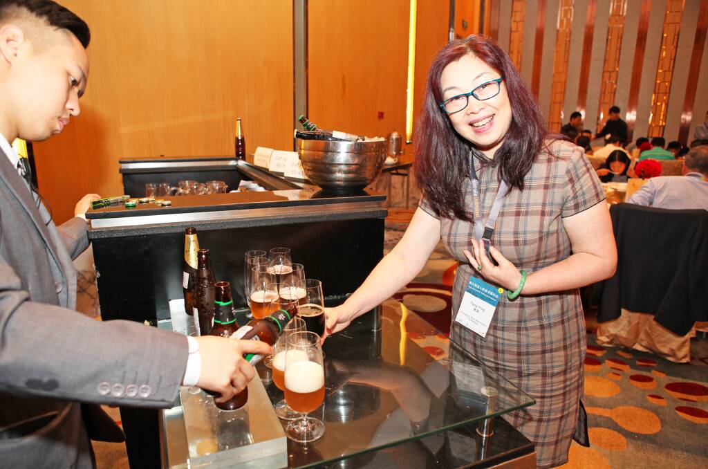 Tang Ying, of the Guangdong Beer Association, enjoys an Aussie tipple during a recent Australian Export Grains Innovation Centre / Barley Australia workshop on Australian barley in China in May.