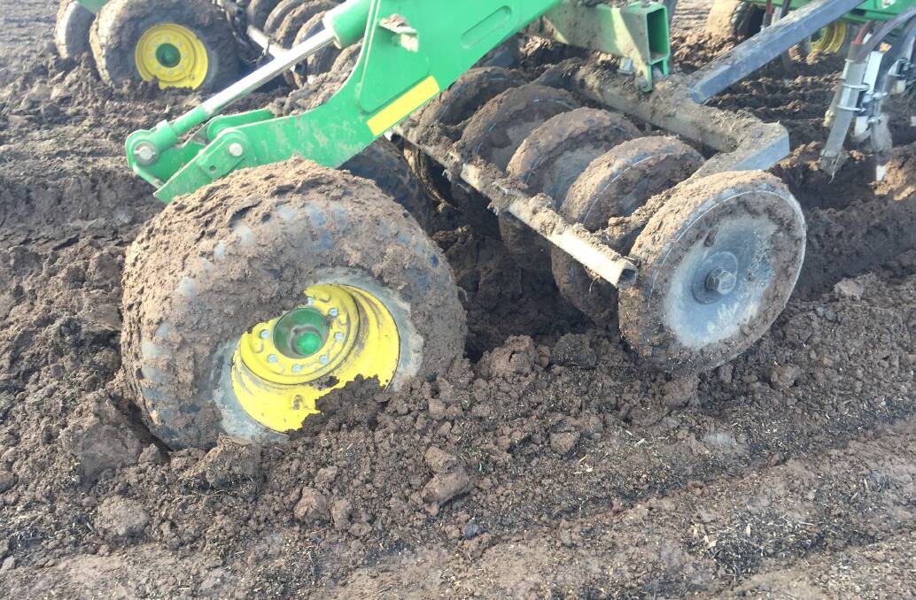 Wet conditions are likely to see high numbers of machines getting bogged at harvest, and farmers are being warned to pull them out with care. Photo: Gregor Heard.