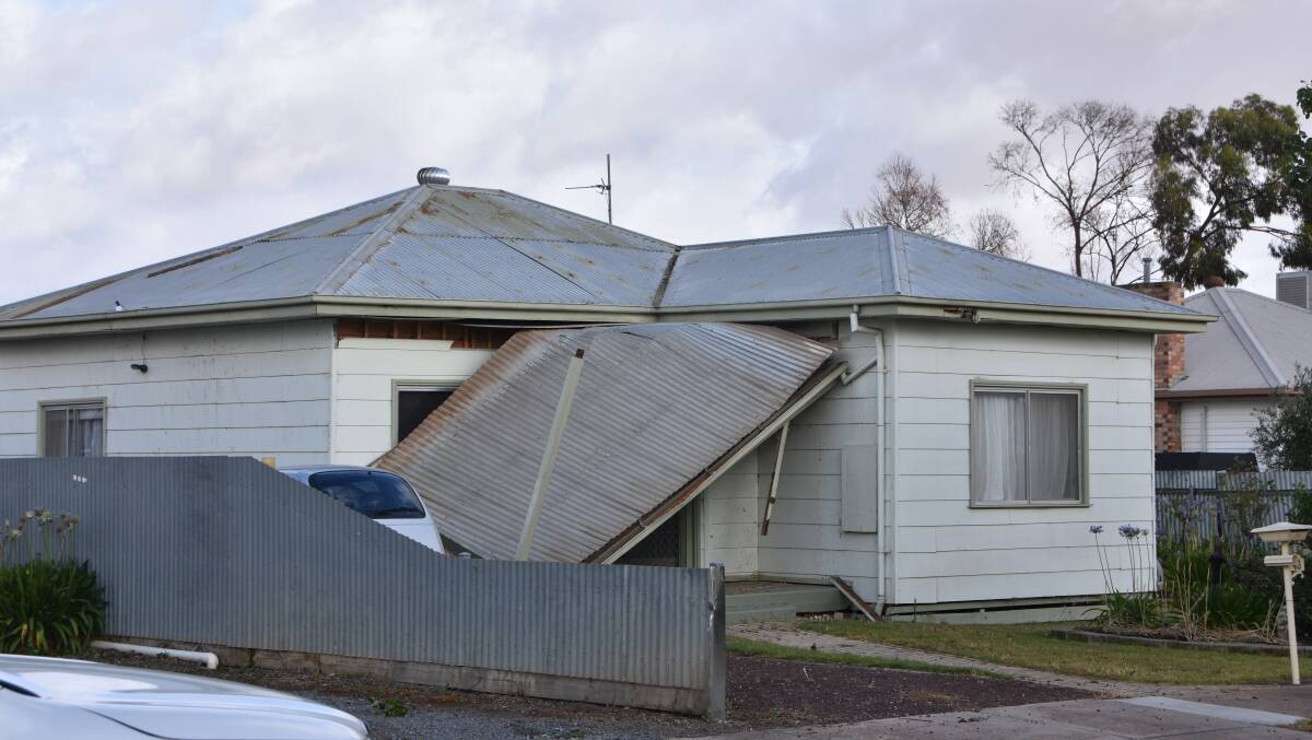 A verandah blown off a house in Francis-st. Photo: Gregor Heard.