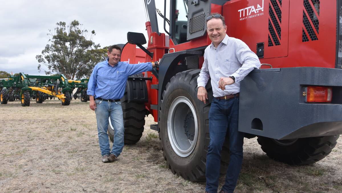 Luke Scott and Jason Barrie, Titan Industries, with one of their company's range of loaders.