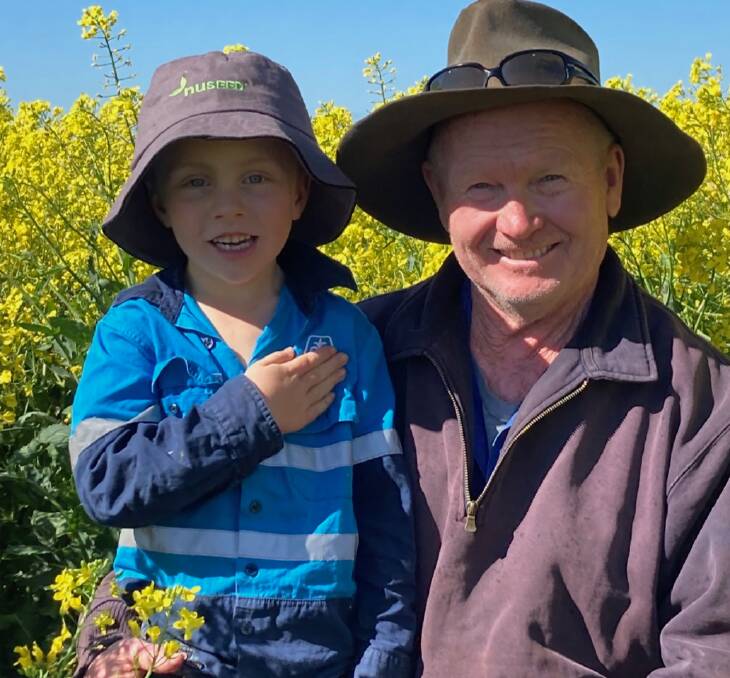 Ken Brain, Coleambally, pictured with grandson Jaxon, is a fan of the speciality canola Monola.