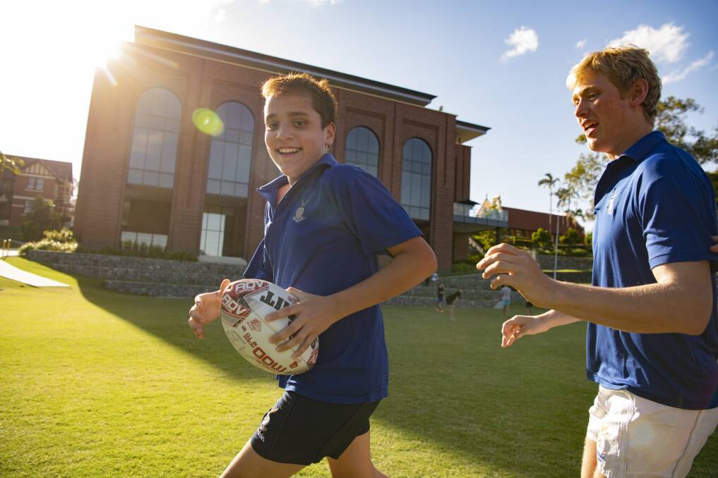 Varied opportunities: Touch football is just one of the many weekend recreation activities on offer at Churchie, where Year 7 boarders have a purposefully designed residence that allows them to settle into boarding life with their peers.