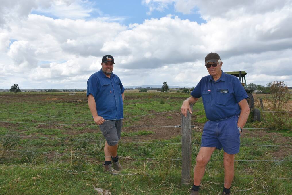 Dairy farmers Gavin Wake and his father Max near the site on their Whittingham property where they hope to build a new herringbone dairy and feed pad. Picture Louise Nichols.
