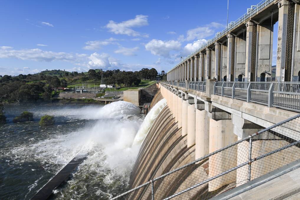 BORDER LANDMARK: Hume Dam has been close to capacity for several months following heavy rainfall. Wetter conditions are likely to continue through summer. Picture: Mark Jesser.