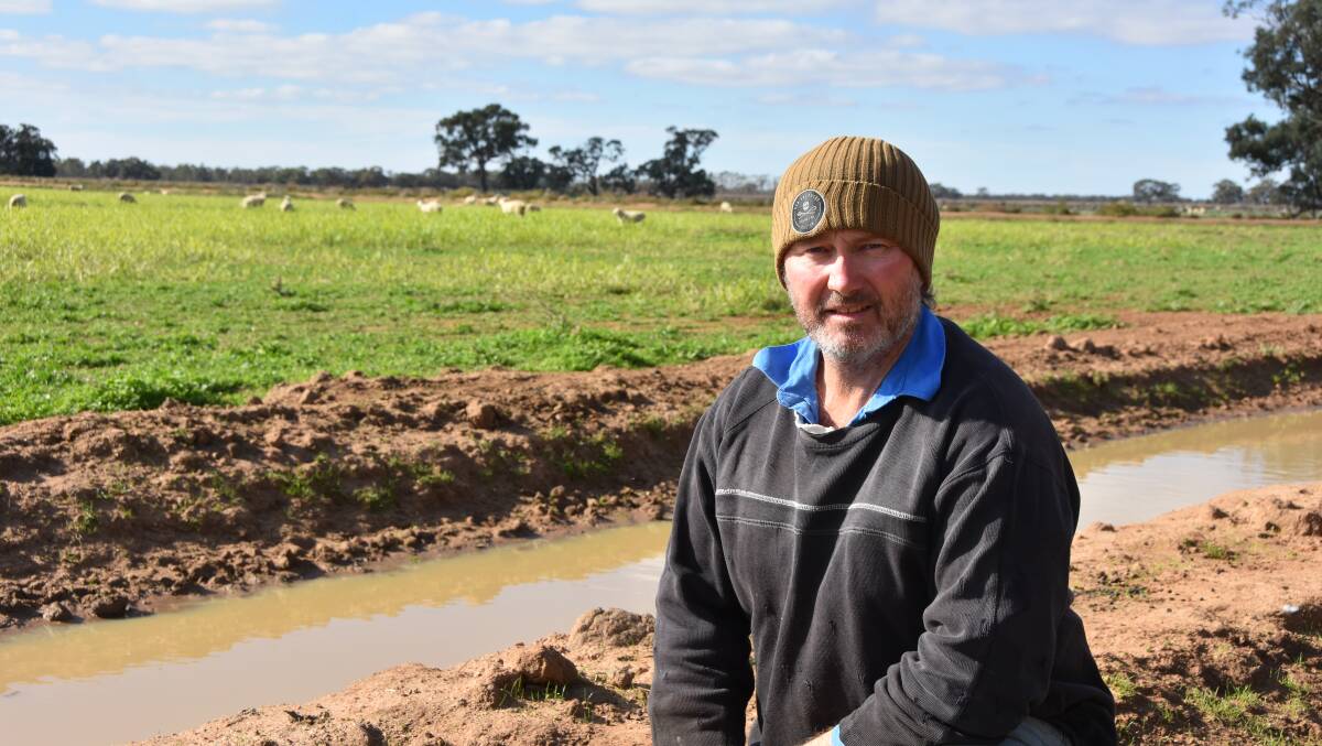 GREATER REGULATION: Morago, NSW irrigator Michael Hughes has given cautious backing to a proposal for an exchange for water trades. .