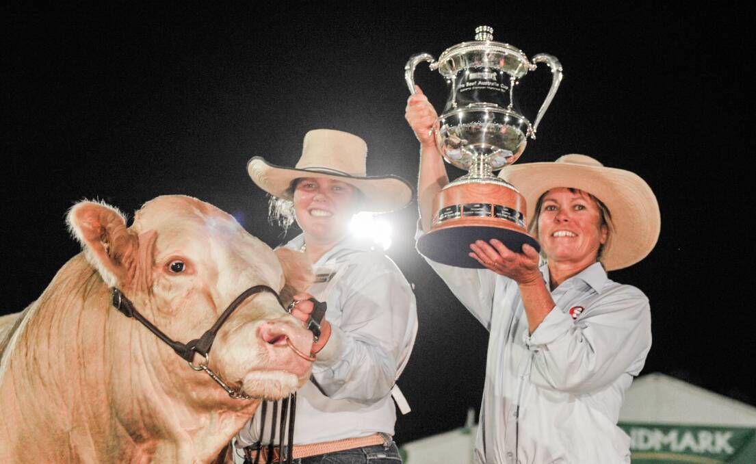 Bec Skene and her mother Elizabeth Skene, Meldon Park Simmentals, Cecil Plains, were jubilant after claiming the Beef Australia 2018 interbreed champion bull trophy. Photo by Kelly Butterworth.