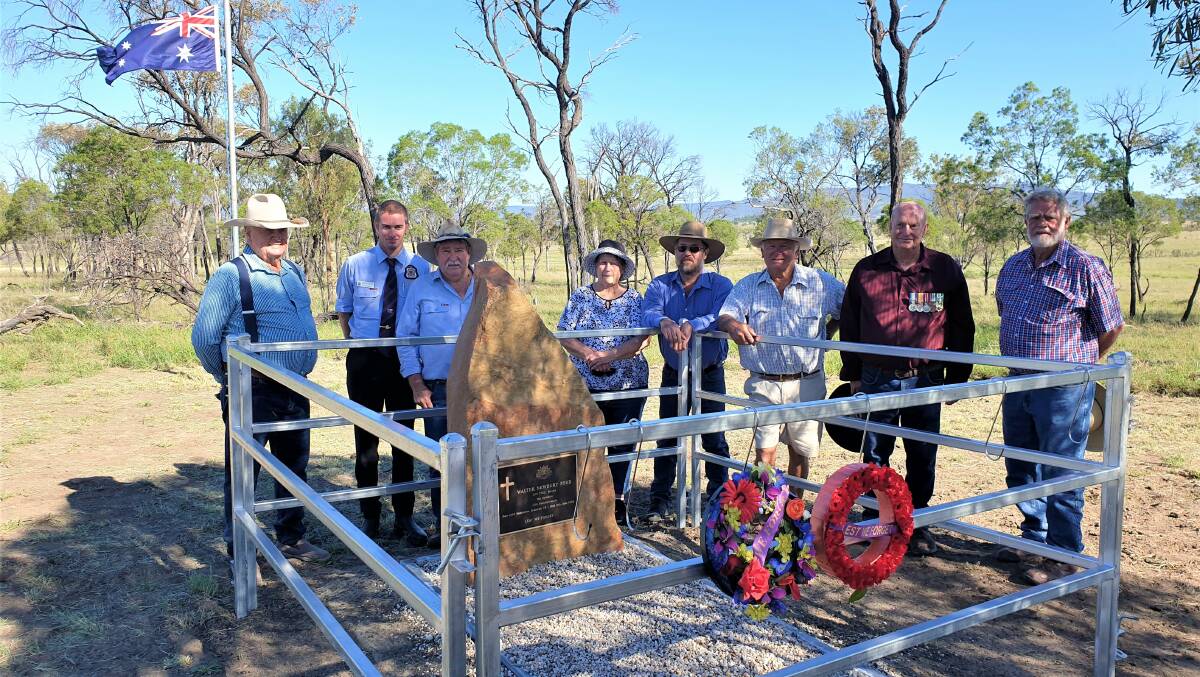 The group that used its combined skills to provide a memorial for Walter Newbury Ford on Glen Olive Station - Cliff Harland, Bryce Duke, Jim Robinson, Beryl Giles, Bill Stanford, Bruce Cosh, Noel Kerr, and Graham Girle, at the gravesite on Australia Day 2021.