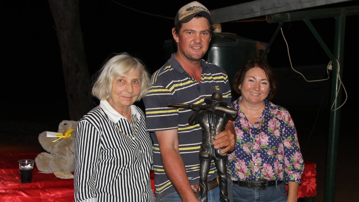 Sonja and Donna Doyle presenting Dave Picone with the inaugural Jon Doyle Memorial trophy on Saturday night.