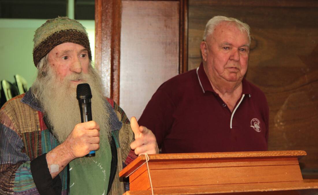 Peter McRae, pictured with the other half of the Bilby Brothers, Frank Manthey, speaking at a Save the Bilby Fund function in Charleville.
