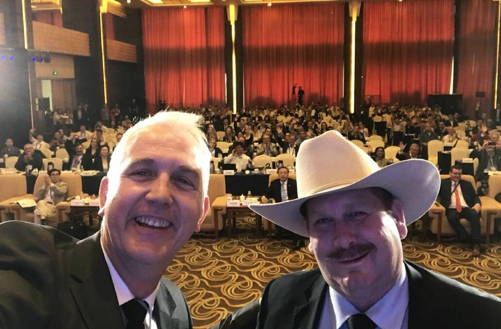 Qantas Founders Museum CEO and Longreach Region councillor, Tony Martin, and Outback Pioneers principal, Richard Kinnon, snapped a selfie before addressing the International Mayors Forum in Zhengzhou.
