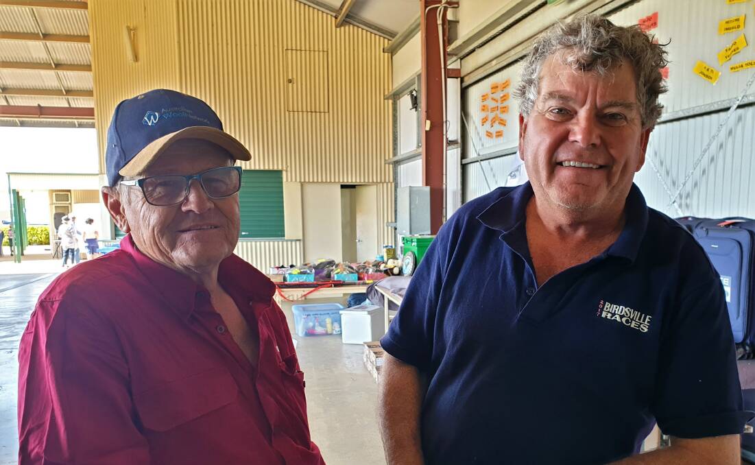 Barcaldine wild dog trapper Tom Lumby and the Barcaldine Regional Council's Good Neighbour program coordinator Larry Lewis.