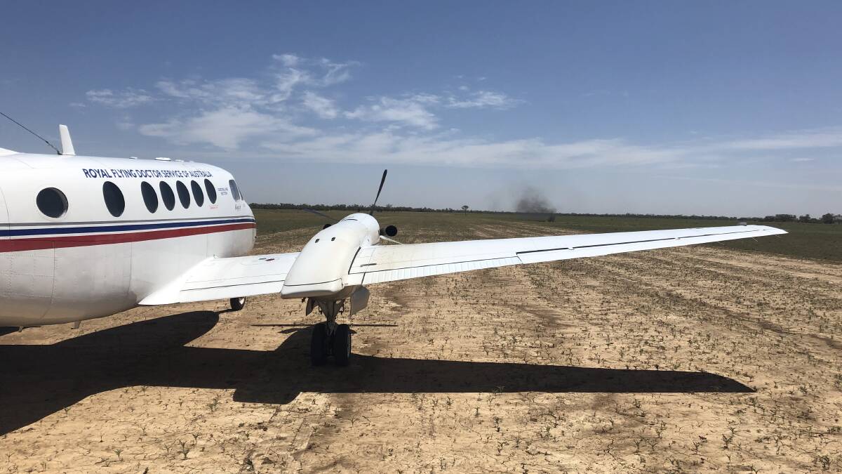 The Royal Flying Doctor Service plane on the strip at Wahroongah Station south of Isisford preparing to evacuate the injured patient. It's first time the medical service has used this airstrip. Picture supplied by the RFDS.