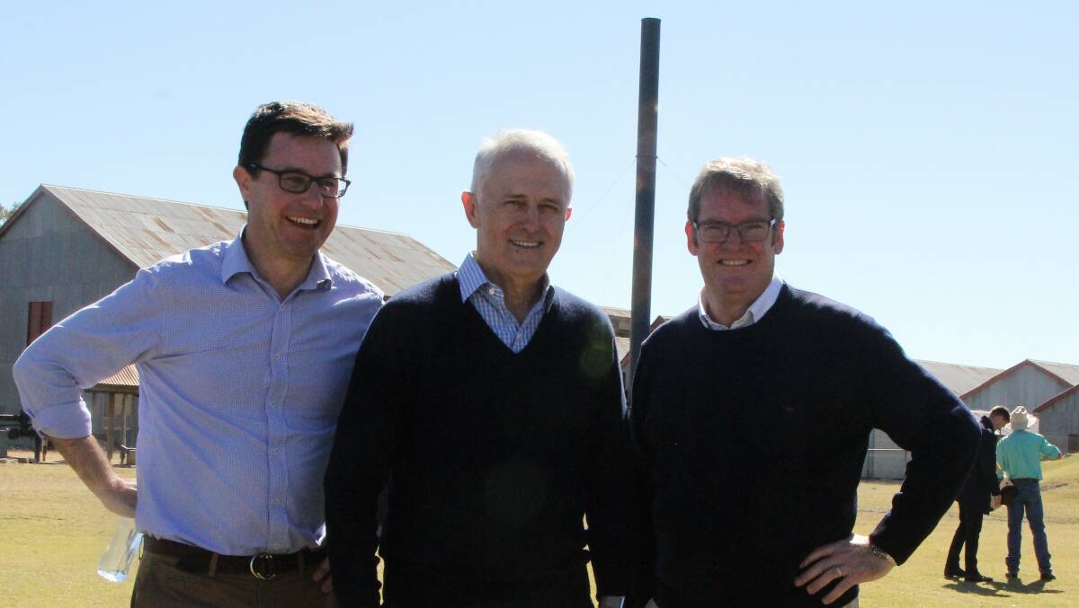 Prime Minister, Malcolm Turnbull, flanked by two Queensland Ministers, David Littleproud and John McVeigh, continuing the federal government's drought listening tour at the Blackall Woolscour.