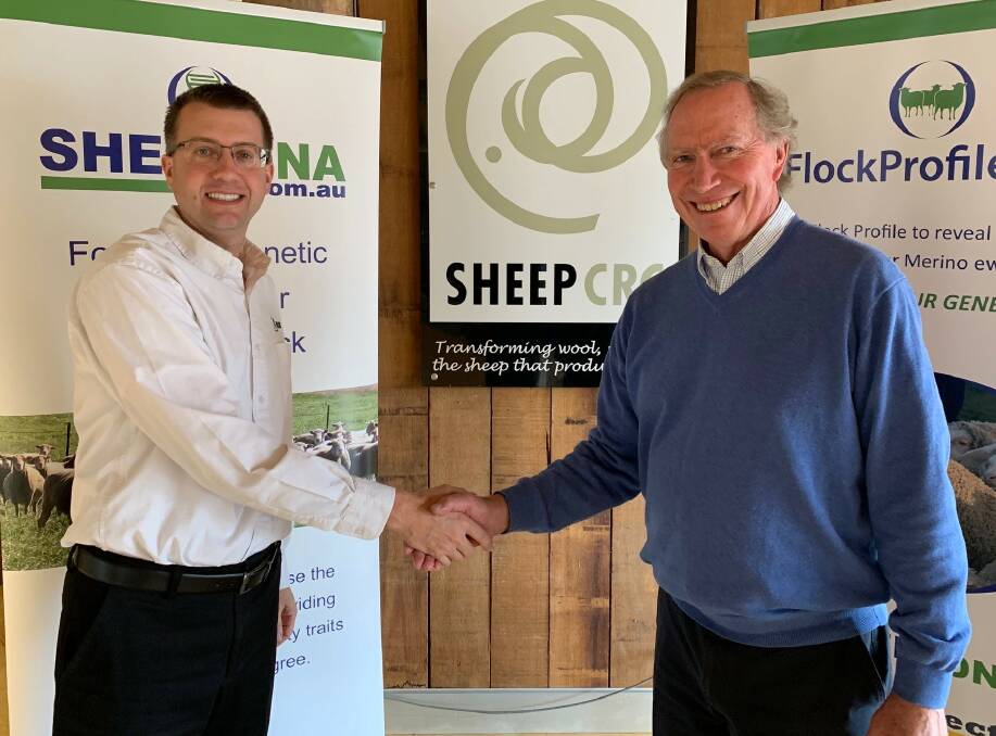Neogen Australasia director Jason Lilly accepts the reins from Sheep CRC chief executive James Rowe.