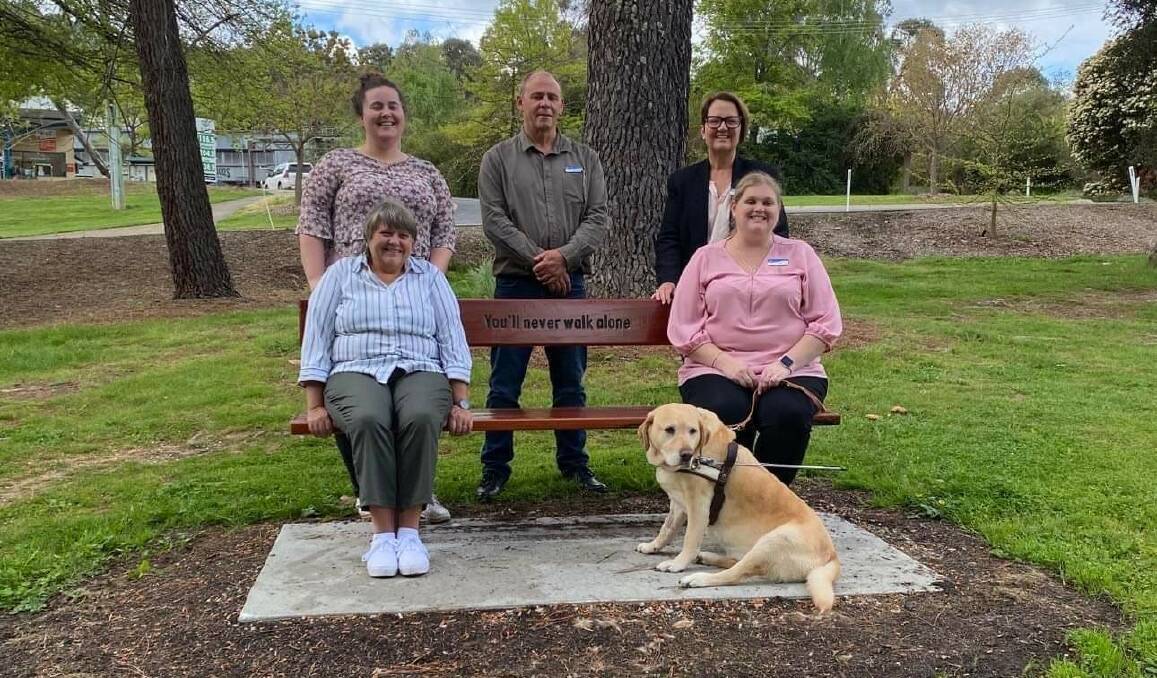 Team United: (back row) Maisie Pilli, Aaron Wallace, Elise Hill, (front row) Jane Witherow and Tegan Allen with the 'chair to share'. Picture supplied by the Gardiner Foundation