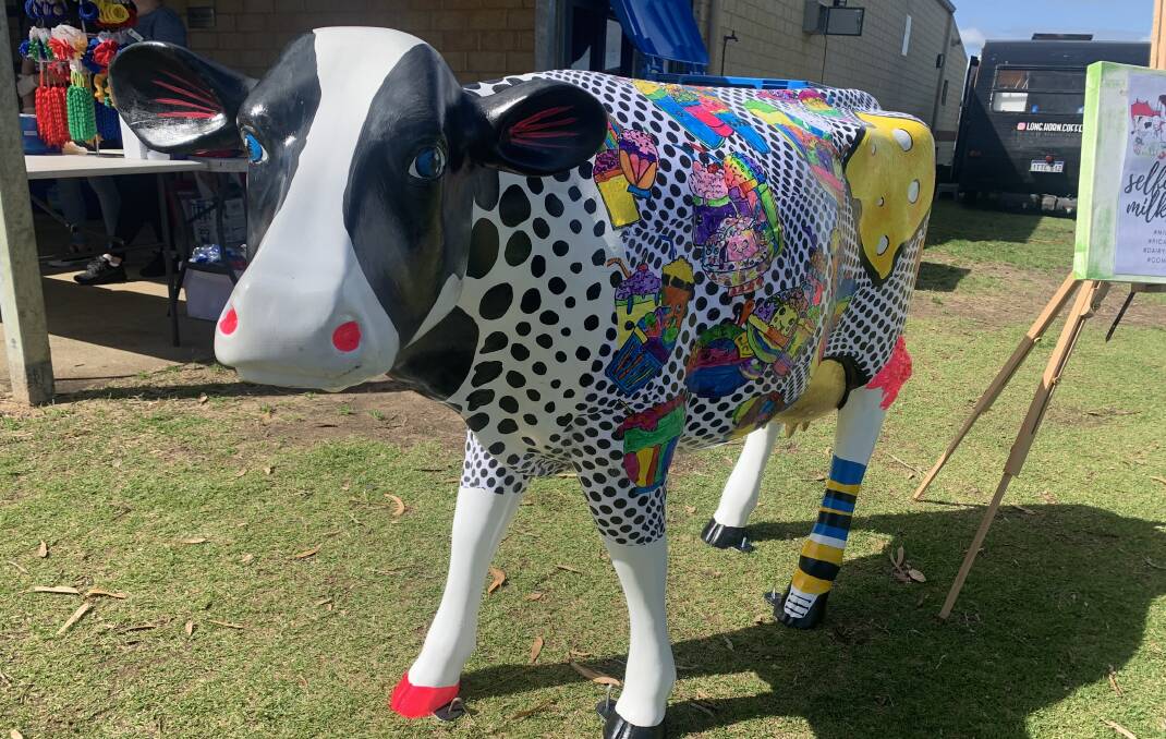 Students decorate an almost life-size fibreglass cow as they learn about the dairy industry through Dairy Australia's Picasso Cows program.