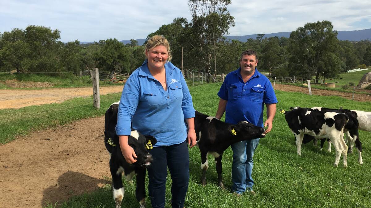 FORGING AHEAD: Ashleigh Rood with husband Michael on their share farm at Bega, NSW.