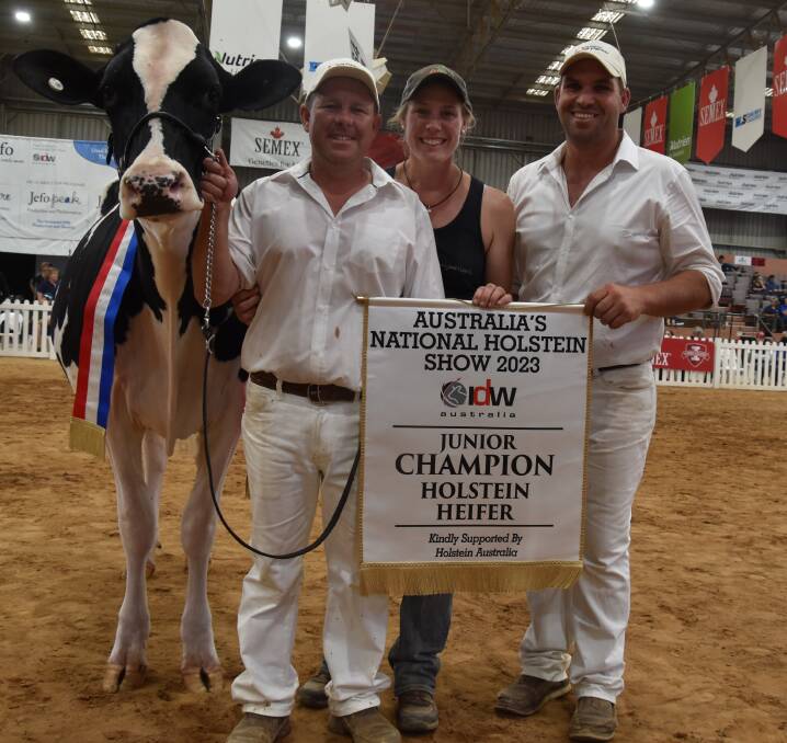 The 2023 International Dairy Week Holstein junior champion Eclipse Perennial C Princess with owners Brad and Jess Gavenlock and Murray Polson. Picture by Carlene Dowie