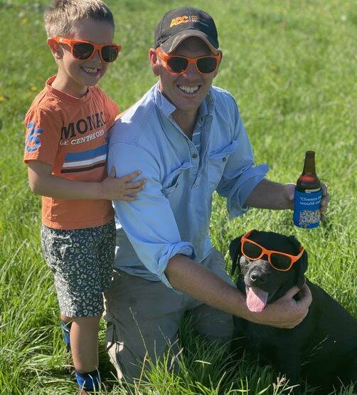 BRIGHT: Australian Dairy Conference president Ben Geard with son Spencer, aged 4 and family dog Ellie. 
