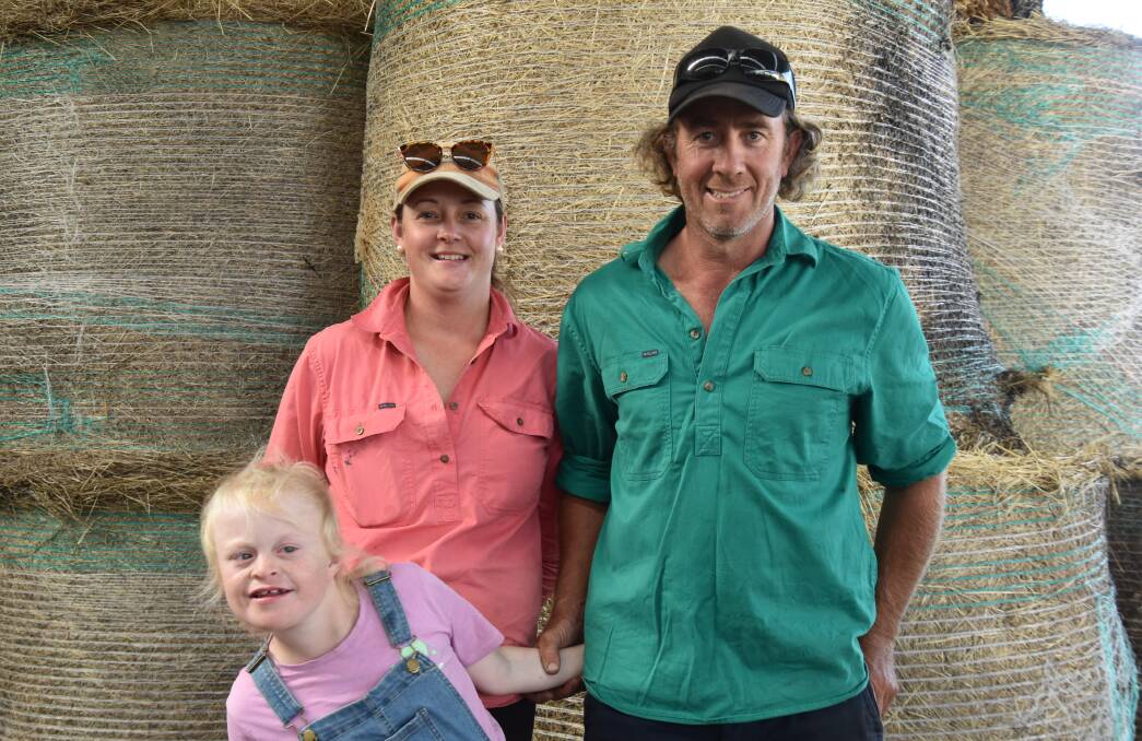 Zed and Marcus Crowden with their daughter Mabelle. Marcus is the fifth-generation of his family to operate the dairy enterprise at Chudleigh, Tas. Picture by Carlene Dowie