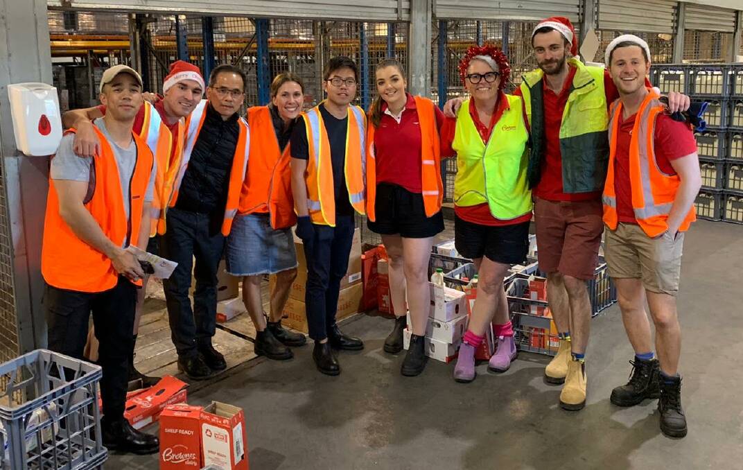 MILKOS: Brownes Dairy 'Milko' home delivery team celebrated at Christmas after a successful launch of the service during the 2020 lockdown.