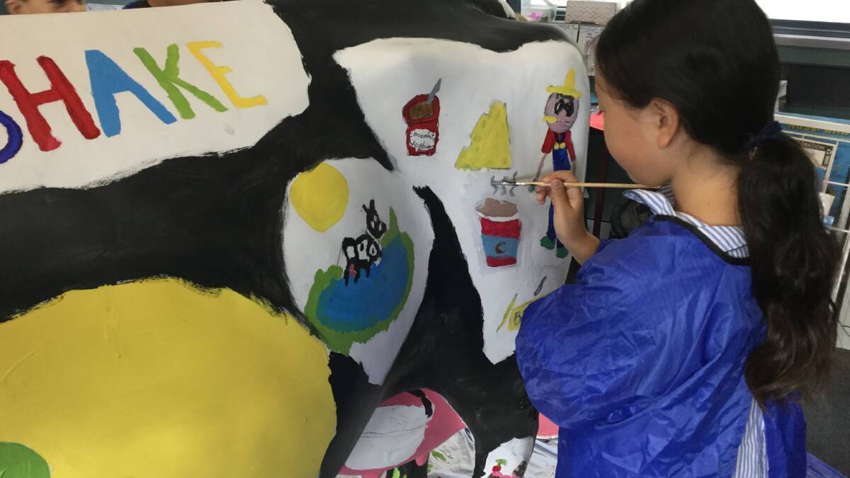 EXCITEMENT: The arrival of a life-size fibreglass cow into schools generates excitement as children get to learn about the nutritional benefits of dairy foods.