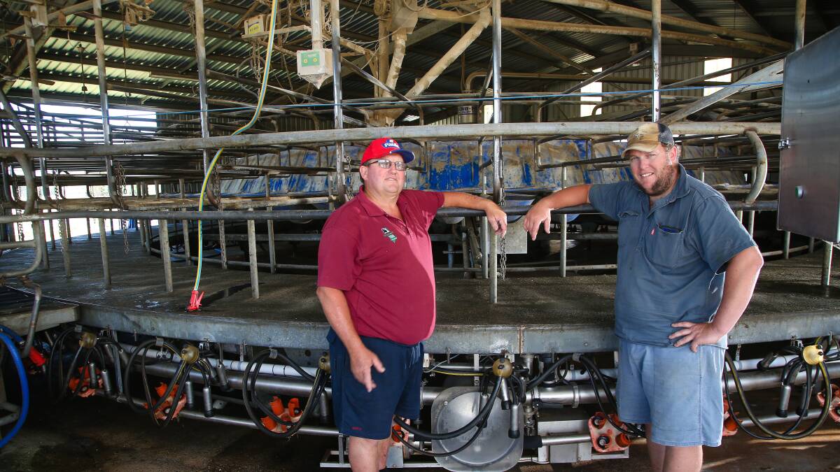FAMILY FARM: Patrick and Brendan Glass in the dairy on the family farm at Gundowring, Vic.